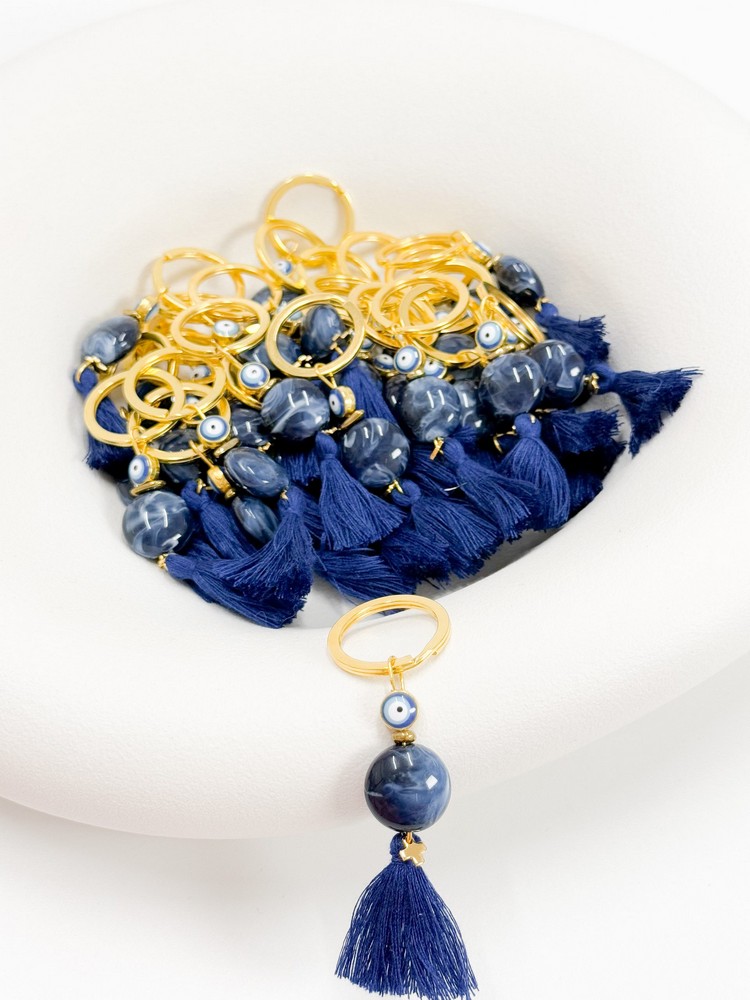 G62 Μαρτυρικό μπρελοκ με stainless steel σταυρό,φούντα και χάντρα με νερά G62 (50τμχ) - Image 1