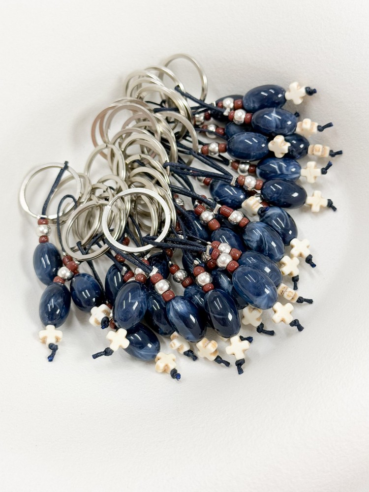 Μαρτυρικό μπρελοκ σε ασημί απόχρωση με χαολίτη σταυρό και χάντρα με νερά G67 (50τμχ)